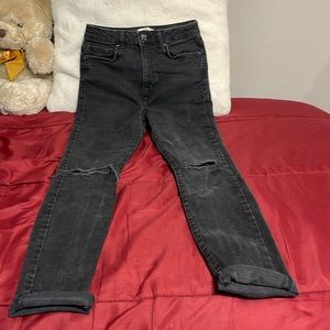 I am selling these high waisted skinny jeans that are grey washed type of color